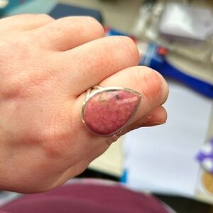 Rhodonite crystal ring size 8. Rhodonite is a pink, manganese-rich crystal.
